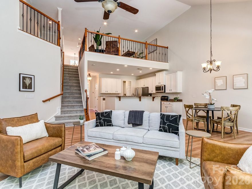 Tucked into one of the most desirable locations in Park South Station, this spacious 3 bedroom, 2.5 bathroom townhome offers over 3,000 square feet of functional and flexible space. One of the standout features is the primary bedroom on the main floor, a highly sought after floorplan in the neighborhood.

This is one of the larger models in Park South Station and offers an incredible amount of living space, including a spacious loft and a huge bonus room perfect for a media room, home office, gym, or playroom. The backyard faces the woods, creating a sense of privacy and a peaceful backdrop to enjoy year round. The home has an abundance of natural light from the many windows.

The home has been recently refreshed and is truly move in ready with fresh paint, new carpet, LVP flooring throughout, and updated cabinetry. Beyond the cosmetic improvements, the major systems have already been taken care of with the HVAC and furnace replaced in 2022 and the hot water heater replaced in 2024. Even better, the HOA is replacing the roof on this unit this year, offering valuable peace of mind for the next owner.

For buyers looking for the space of a single family home without the exterior maintenance, this is an ideal fit. The HOA maintains the exterior of the townhomes, allowing for a low maintenance lifestyle without sacrificing square footage or functionality.

Park South Station is one of South Charlotte’s most loved communities, known for its tree lined streets, sidewalks, and unbeatable amenities. Residents enjoy a Jr. Olympic swimming pool, clubhouse, fitness center, dog park with separate areas for small and large dogs, playground, recreation area, green space, and direct access to the Little Sugar Creek Greenway. The neighborhood also features an active social committee, regular food truck events, and a vibrant community that makes it easy to feel at home.
