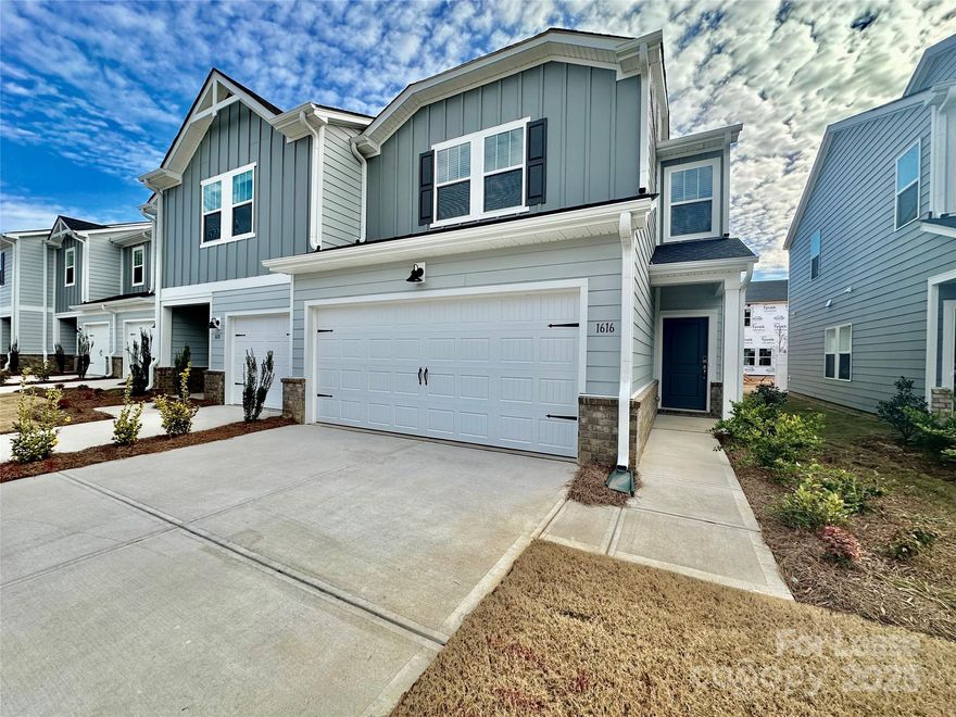 This beautifully designed new townhome in Braemar Village offers a blend of modern elegance and energy efficiency. The main floor has open concept living with white kitchen cabinets, granite countertops, stainless steel appliances and large center island. Beautiful luxury vinyl plank on the main floor. Also, two car garage and rear patio. The upstairs features 3 nicely sized bedrooms along with a primary ensuite with a large walk in closet. You will love this one with all it's new builder features!