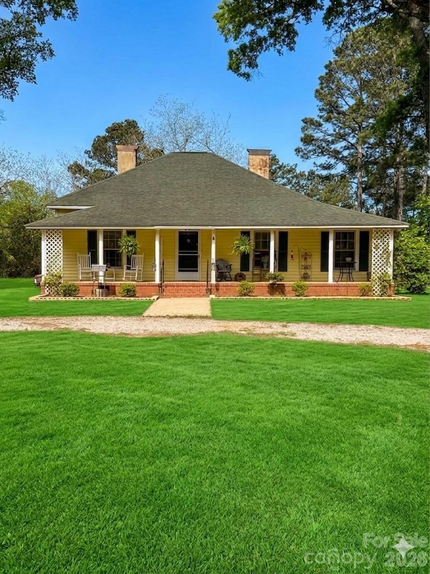 Welcome to peaceful country living in Blackstock, SC! Situated on 2.02 acres, this property offers the perfect blend of space, privacy, and versatility. Whether you’re looking to enjoy quiet rural living, start a small farm, or have room for recreational use, this land provides endless opportunities.

The home features 3 bedrooms and 1.5 bathrooms, with added flexibility—the existing laundry/utility room can be converted to add a second full bathroom, with plumbing already in place. The space can also be reverted back to a dedicated laundry room with hookups available, allowing you to customize it to fit your needs. Both areas can be restored to the home’s original layout if desired. Enjoy relaxing mornings and evenings on the covered front and back porches, perfect for taking in the natural surroundings.

This property is equipped with both electric and gas hookup options, giving you flexibility to suit your needs. Camper hookups are already installed, including a 30-amp RV hookup, making it ideal for RV use or additional living arrangements.

Recent updates including a new drain field that has been pumped, a new hot water heater, updated plumbing, and new breaker panels installed both inside and out. The detached building is wired for lighting, offering a great setup for a workshop, storage, or hobby space.

A tower located out front allows for Starlink internet, with the option to choose Spectrum fiber as well—giving you reliable connectivity while enjoying country living.

The property also features a convenient horseshoe driveway, providing easy access in and out while offering ample parking space for multiple vehicles, trailers, or equipment. The layout of the land allows for added usability, whether you’re looking to expand, garden, or create your own outdoor retreat. With open space and room to roam, this property is ideal for those who value privacy and flexibility.

There is plenty of potential to further enhance the property to fit your lifestyle. Whether you envision adding additional outdoor structures, creating a workshop area, or simply enjoying the wide-open space, the possibilities here are endless. The acreage provides a peaceful setting while still offering functional land use.

If you’re looking for a property with land, functionality, and room to grow, this is a must-see. Experience the charm and freedom of country living while still being within a convenient distance to nearby towns and amenities.