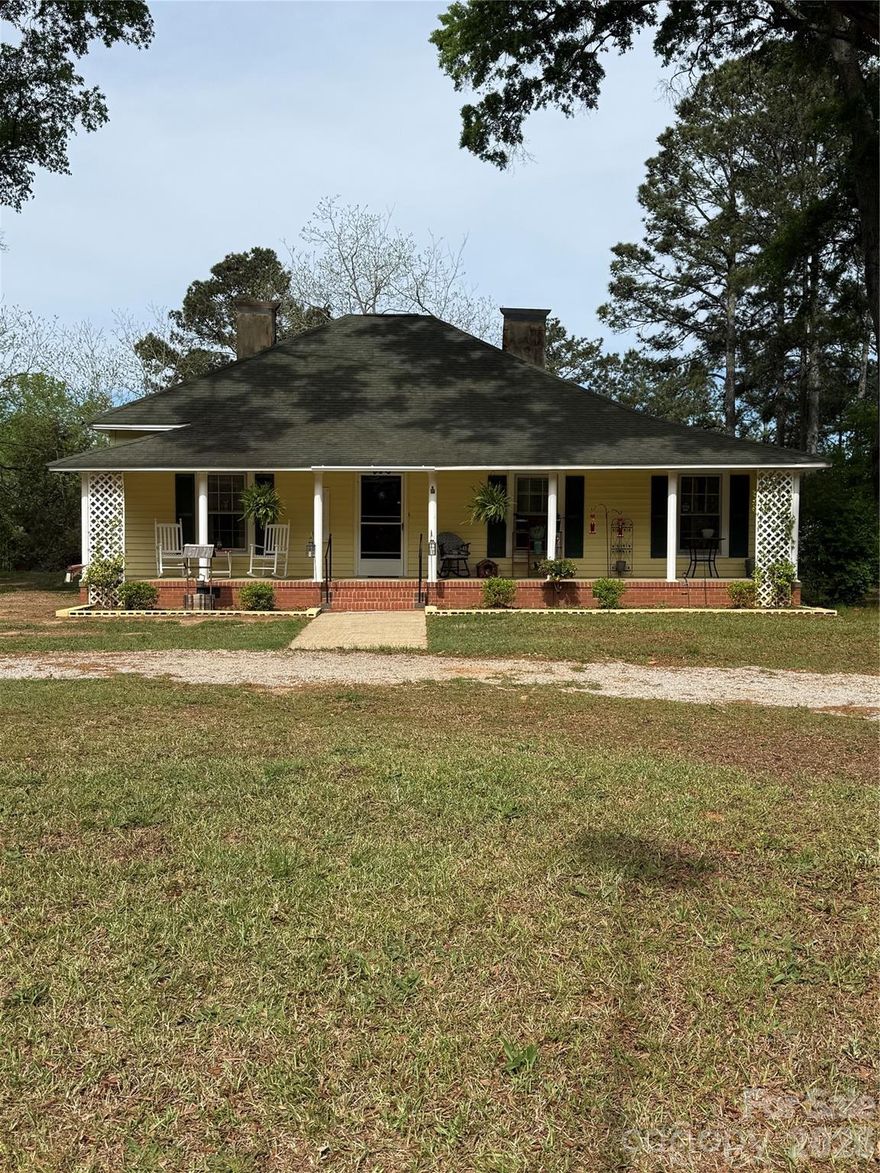 Welcome to peaceful country living in Blackstock, SC! Situated on 2.02 acres, this property offers the perfect blend of space, privacy, and versatility. Whether you’re looking to enjoy quiet rural living, start a small farm, or have room for recreational use, this land provides endless opportunities.

The home features 3 bedrooms and 1.5 bathrooms, with added flexibility—the existing laundry/utility room can be converted to add a second full bathroom, with plumbing already in place. The space can also be reverted back to a dedicated laundry room with hookups available, allowing you to customize it to fit your needs. Both areas can be restored to the home’s original layout if desired. Enjoy relaxing mornings and evenings on the covered front and back porches, perfect for taking in the natural surroundings.

This property is equipped with both electric and gas hookup options, giving you flexibility to suit your needs. Camper hookups are already installed, including a 30-amp RV hookup, making it ideal for RV use or additional living arrangements.

Recent updates including a new drain field that has been pumped, a new hot water heater, updated plumbing, and new breaker panels installed both inside and out. The detached building is wired for lighting, offering a great setup for a workshop, storage, or hobby space.

A tower located out front allows for Starlink internet, with the option to choose Spectrum fiber as well—giving you reliable connectivity while enjoying country living.

The property also features a convenient horseshoe driveway, providing easy access in and out while offering ample parking space for multiple vehicles, trailers, or equipment. The layout of the land allows for added usability, whether you’re looking to expand, garden, or create your own outdoor retreat. With open space and room to roam, this property is ideal for those who value privacy and flexibility.

There is plenty of potential to further enhance the property to fit your lifestyle. Whether you envision adding additional outdoor structures, creating a workshop area, or simply enjoying the wide-open space, the possibilities here are endless. The acreage provides a peaceful setting while still offering functional land use.

If you’re looking for a property with land, functionality, and room to grow, this is a must-see. Experience the charm and freedom of country living while still being within a convenient distance to nearby towns and amenities.
