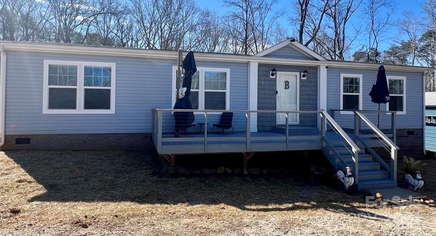 Here is your chance to own a nice quiet piece of the country! This beautiful 3/2 on 3.3 acres in a peaceful setting provides a little piece of the country but just 10 min to restaurants and shopping! The 5 year old home features a nice big kitchen island with an open floor plan and 3 spacious bedrooms! Home has a nice built in desk in the hallway and large mudroom with a sink and a drop zone!  Outside is an 18' x 30' partially enclosed building that has a carport and electricity.  Fenced back yard, owner currently has chickens and a goat and the chicken coop will stay.  Property looks out over a pond across the street. Septic and Well were just installed on the property in 2019.  Seller is giving a 1 year warranty with home. Home is USDA eligible!