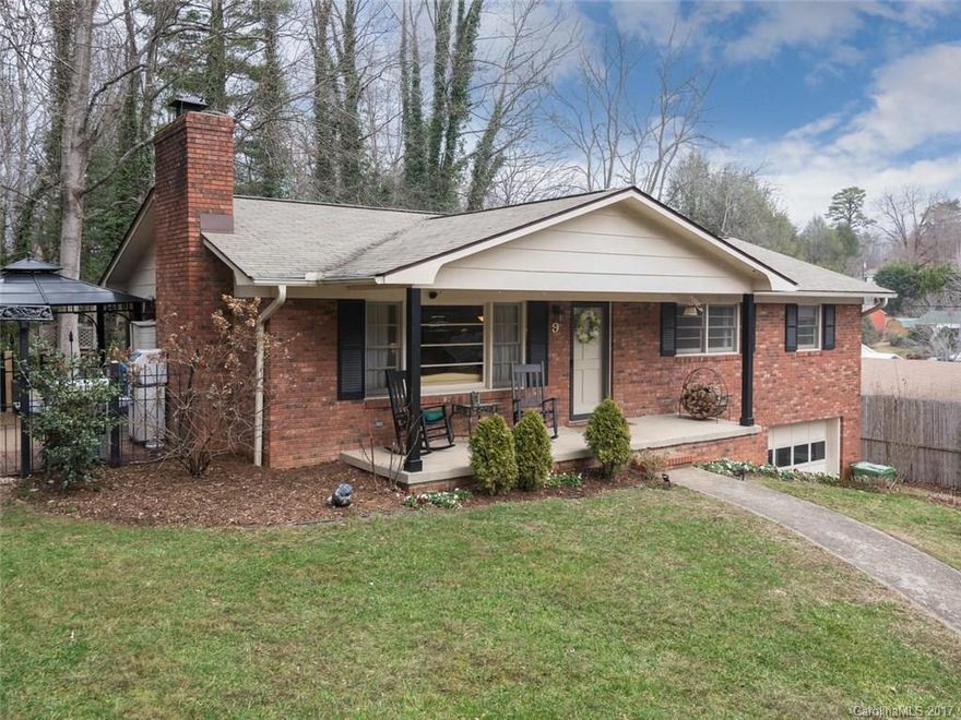 Gardener's Paradise and just a walk to Haywood Rd from this 3 bedroom home in West Asheville. Hardwood floors, wood fireplace, open/eat-in kitchen, breakfast bar, granite counters, bonus room on lower level, large basement for parking/storage/workshop/laundry, and other uses (potential to finish). Side patio and deck, covered front porch, 1-car garage, large private back yard, great location, great condition! Home Warranty Included!