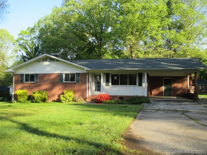 Wooded floors 3 bedrooms and 2 baths single story home that sits on 0.38 acre nice lot features wooded floors living room, kitchen with breakfast bar and doubled sinks bath. Home includes 1 car attached carport and back deck. This is an incredible deal! Total SqFt of 1,380. Repair escrow of $825.00