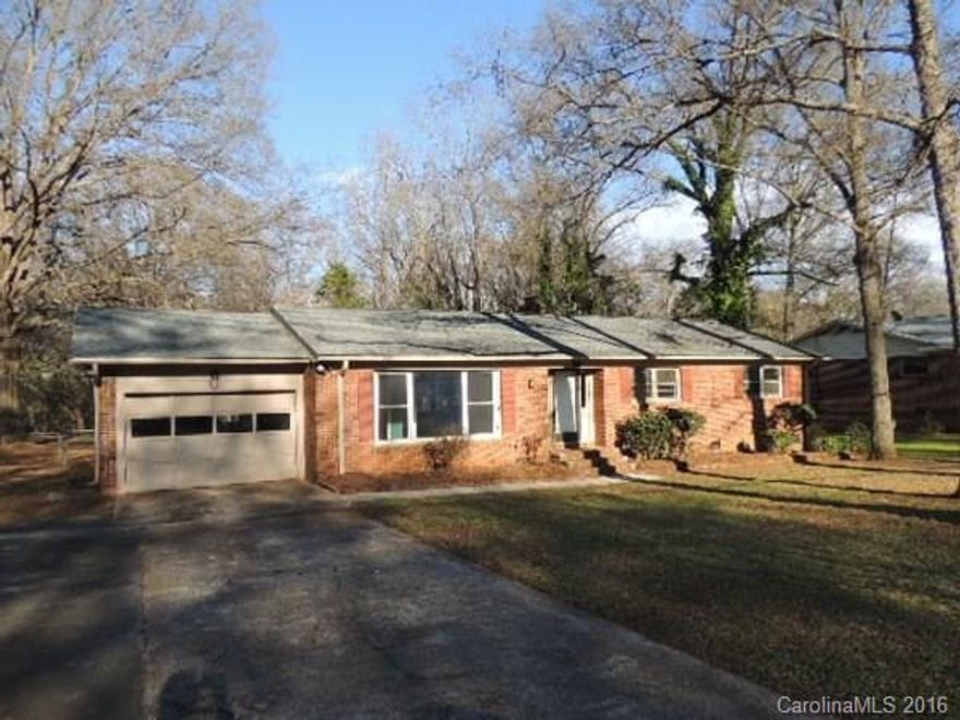 Fannie Mae Homepath listing. Priced below tax value. Beautiful hardwood floors. Spacious den with fireplace. Large kitchen with real wood cabinets. Gas stove. Rare attached garage. Perfect level rear yard. Very nice concrete patio. Great location. Great house.