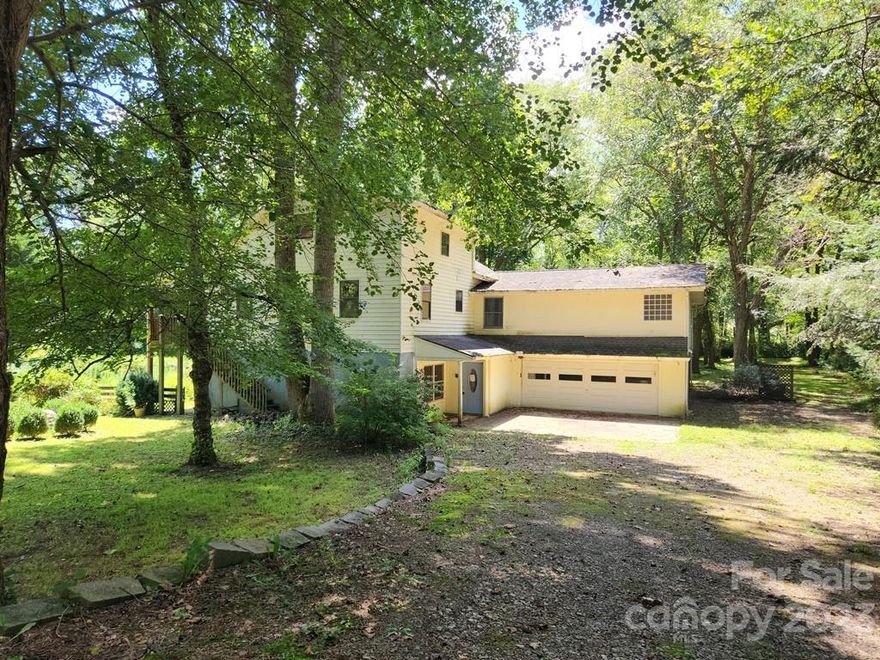 Lovely, level, 1+ acre park-like setting on the Nottely River. Just 10 minutes from Murphy. This unique property's features include a living room w/ fireplace, a huge den, 2 kitchens, a (primary) bedroom suite w/ office, and an 800+ square foot guest apartment in the lower level (w/ a separate available entrance). Awaiting new owners to update/renovate and make their own. Owned by HUD. Case#387-057700. Insured, Subject to Appraisal. Seller/listing agent makes no representations or warranties as to property condition. Sold As,-Is. Equal Housing Opportunity. Seller may contribute up to 3% for buyer closing costs upon buyer request. Property located in a flood zone.