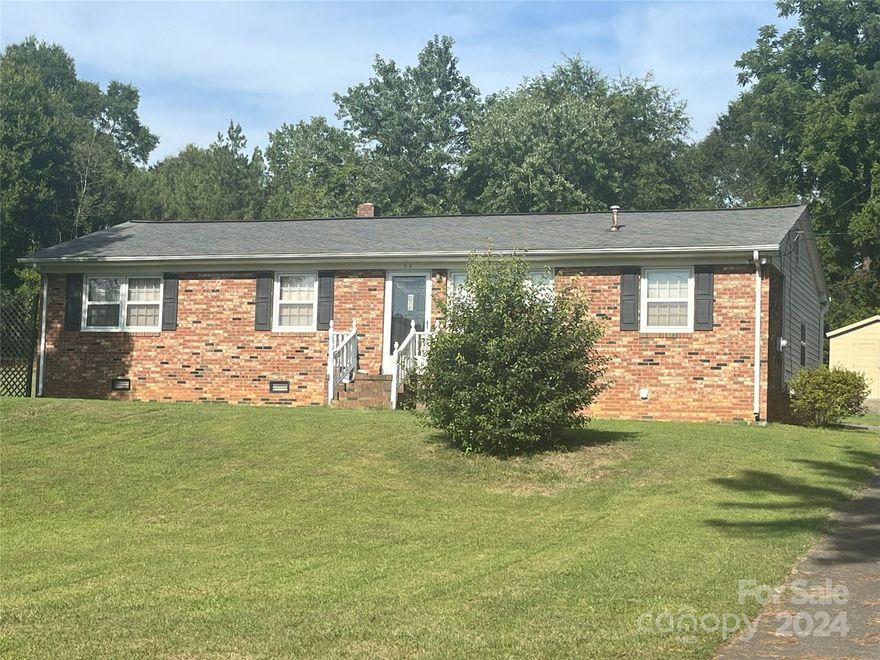Come and see this move in ready brick ranch located in the Chapel Grove Community of Gastonia!  This home is in the perfect location to quickly access all of the restaurants and shopping venues that Gastonia has to offer!  Short commute to major highways!  From the beautiful hardwood floors throughout the living room and bed rooms to the huge yard, there is a lot to appreciate about this well maintained home. Huge Den area could be used as an office or extra bedroom.  Nice shed for storage in the backyard.  Perfect for the first time home buyer, or someone looking for low maintenance living!  Schedule your appointment to come and see today!