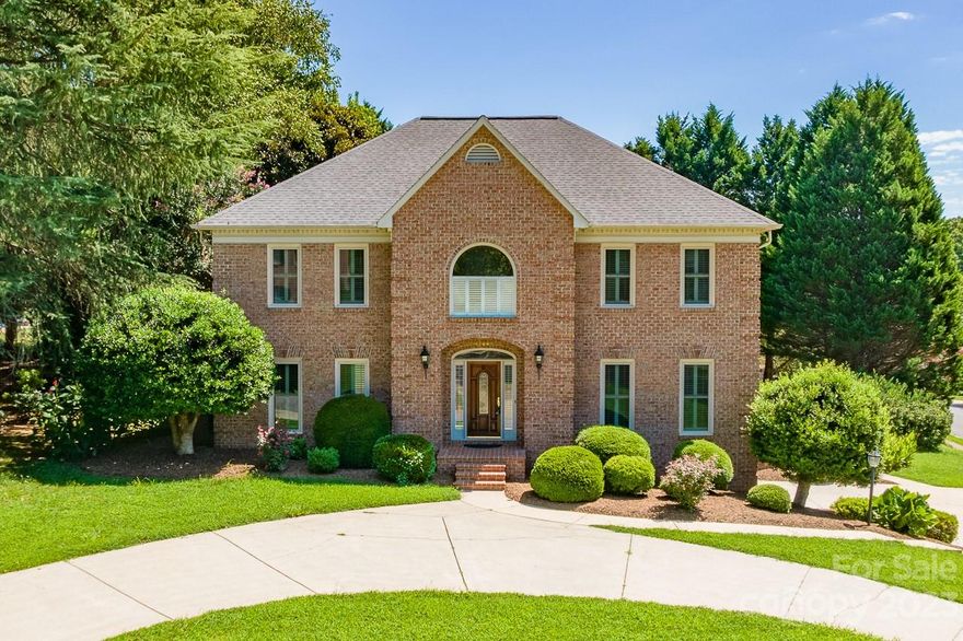 Welcome Home! Come see this beautiful waterfront community located on a corner lot with 0.59 acres. Home has been recently updated. Hardwood floors throughout entire home, windows all updated in 2022, hot water heater updated in 2016, bathrooms updated with tiles in 2020, fresh paint through out whole house in 2023, and granite counter tops in kitchen and main bathrooms upstairs. Main bedroom suite wraps around with a sitting area. Spacious bedrooms for everyone and a huge entertainment room in the basement for all your guest. This also features 9 ft ceilings on the main level with crown and dentil moldings. With this being a corner lot with a circular driveway and with a lake view, the possibilities are endless.