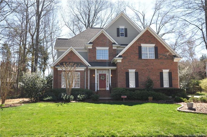 Gorgeous 5 Bedroom/3 Bathroom Home Nestled on Cul-de-sac Lot w/Guest Room on Main and Full Bath.  NEW AC INSTALLED MARCH 2016' Downstairs. Kitchen w/Granite, Tile Backsplash and Hardwood Floors.  Formal Dining and Formal Living. 2 Story Family Room Features Hardwood Floors and Beautiful Arches. Master Bedroom w/Trey Ceiling. Master Bathroom w/Dual Sinks, Tiled Shower w/Frameless Door and Garden Tub. Large Screened Porch Overlooks Natural Backyard w/Extended Patio and Deck w/Seating. Irrigation