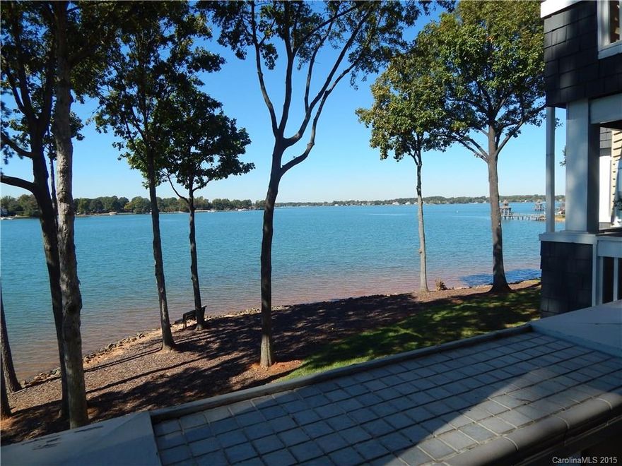 Beautiful views of Lake Norman greet you as soon as you enter this waterfront condo. Master bedroom & great room are waterfront with wonderful views & access to large waterfront deck! 2nd bedroom has water views too! Unit has been undated with new stove,new ceiling fans, new light fixtures,new faucets,new door hardware & fresh paint. Laminated hardwood floors in main living area & both bedrooms. Laundry off 2nd bathroom. Seller is offering to install granite in the kitchen with acceptable offer.