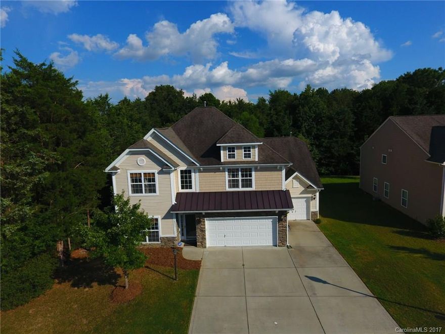 Check out this beautiful, spacious home in the sought after subdivision of Waterlyn in the Steele Creek area! Home features 5 beds, 3 full baths, 3-car garage, large kitchen with granite counters, screened in porch, 6' tall privacy fence, tankless water heater and a whole home filtration system! In-law suite on main floor and over-sized owners suite upstairs with a huge master bath featuring separate shower and garden tub. Community features walking trails, pond, community pool and clubhouse!