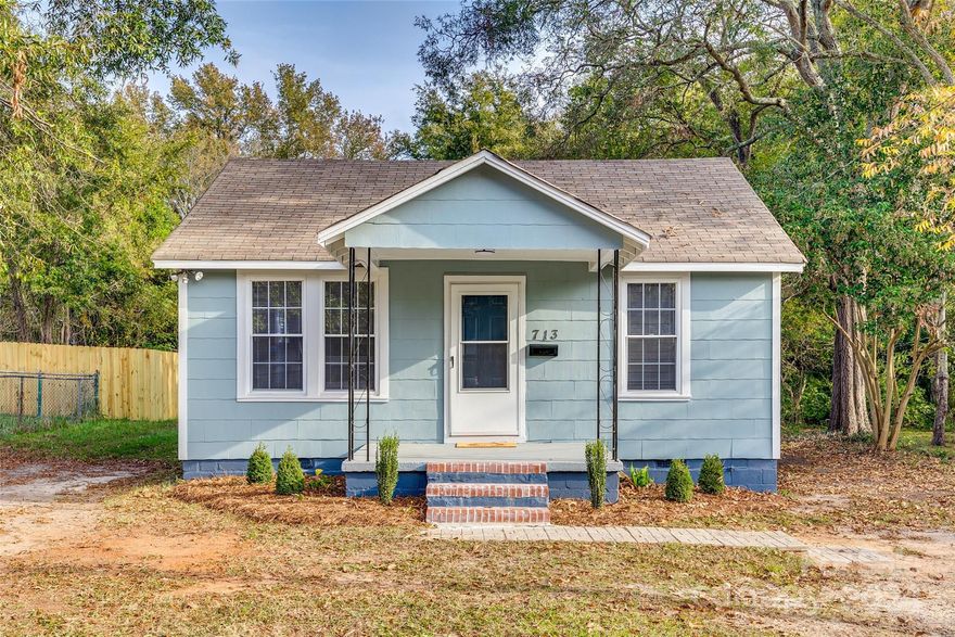 Discover charm and modern comfort in this newly renovated 2-bedroom, 1-bath bungalow in the heart of downtown Rock Hill! Fresh paint and new flooring throughout add a clean, updated feel. The kitchen shines with new countertops and a stylish backsplash. The upgraded bathroom features a tiled shower surround, a new vanity, updated lighting, and contemporary tile flooring. Enjoy a convenient mudroom leading to a spacious backyard, perfect for relaxing or entertaining. This home is steps away from downtown shops, restaurants, and just minutes from I-77. Located in a vibrant, growing neighborhood—come see it today!