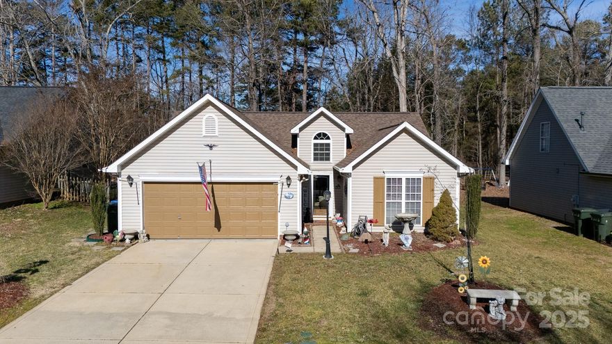 Super cute 3 bedroom, 2 bath home with split bedroom plan.  Updated paint, appliances, fence, awning, flooring, sprinkler system.  Cozy fireplace inside and fire pit in the backyard!  Cute building also stays.  Great neighborhood convenient to shopping, dining and entertainment.  Low HOA dues that cover the clubhouse, playground and pool.