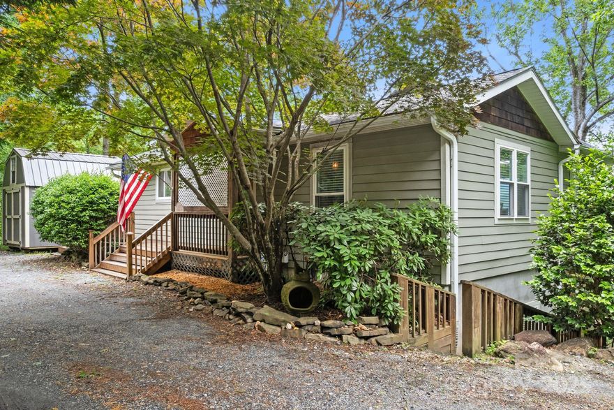 Charming furnished 3BR/2BA home in Lake Lure with stunning lake and mountain views! This 1,499 sq ft home sits on a spacious lot and features numerous updates throughout. Enjoy outdoor living on the covered porch or multiple decks—perfect for relaxing or entertaining. Inside, the open layout offers modern finishes, and an option to keep some of the furnishings, makes it truly move-in ready. The large lot provides privacy, and there’s a storage shed for your tools or lake gear. Ideal as a full-time residence, vacation getaway, or investment property. Just minutes from the lake, dining, and local attractions. A turnkey mountain-lake retreat!