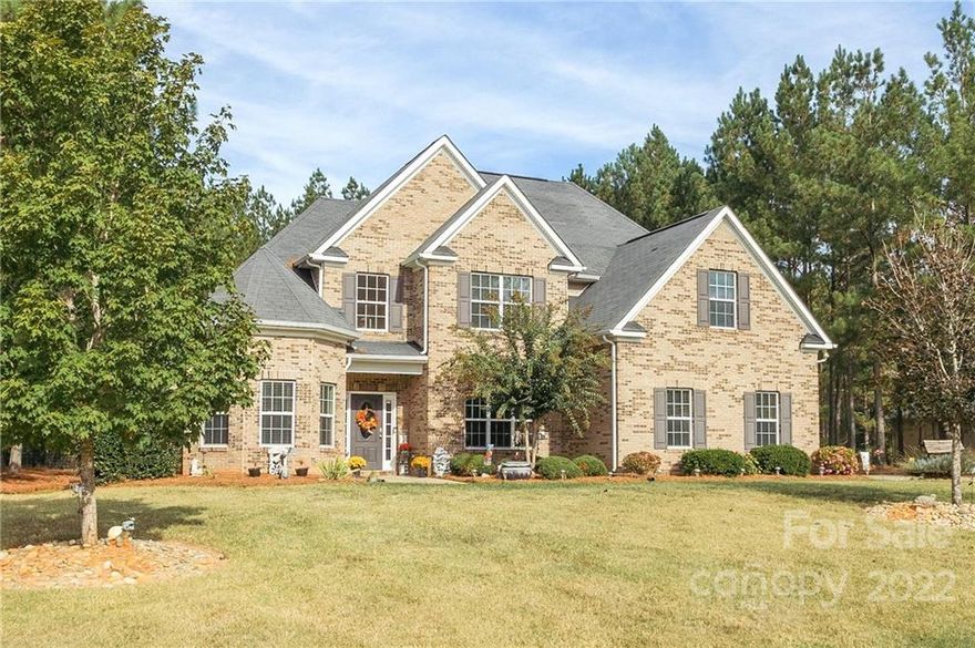 This gorgeous custom home in the Lauren Pines subdivision has so much to love! It's situated on a private, 1+ acre corner lot with a fenced-in, level backyard. It has a long driveway and 2-car side-load garage! With nearly 2500 sq ft, the 5 bedrooms, 3 full baths, and loft/bonus room provide plenty of space! The two-story foyer is welcoming and there are beautiful hardwood floors throughout most of the 1st floor. The primary bedroom suite has tall tray ceilings, a sitting area, two walk-in closets, separate vanities, garden tub, shower, and water closet. The kitchen has granite countertops, stainless steel appliances, a large island, pantry, and plenty of cabinet storage. There is also a second bedroom/bathroom suite on the first floor along with the walk-in laundry room and dining room. On the 2nd floor you will find 3 more bedrooms and a loft/bonus room. The backyard has a storage building with electricity and offers tons of space for recreation and entertaining!