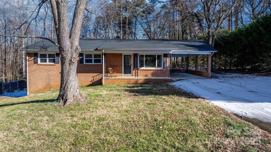 New Listing!  Come see this newly updated, low maintenance home that is in Move-In Ready condition.  All brick ranch style home w/unfinished basement.  This 3-bedroom, 1 & 1/2 bath home features updates including bathrooms & vanities, updated flooring, appliances & cabinetry.  The large living room welcomes you in from the covered rocking chair front porch & w/ an open floorplan the kitchen is open to the dining & living areas.  Kitchen features SS appliances & updated cabinetry.  The master bedroom is located down the hall & features a single vanity master bath.  Bedrooms 2 & 3 share a full hallway bathroom.  The unfinished basement is accessible from the hallway and features a single garage.  The single car carport has a walkway to the back deck where there is a fully fenced-in back yard.  Laundry is in the basement.    Tons of room for storage.   If you are a picky buyer this home is for you!   Don't delay - Call today!!!