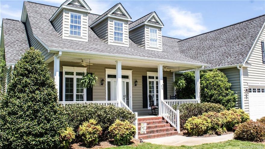 Beautiful Country Setting w/In Law Suite & Acreage! Model home quality! Open concept. 2 bed plus master down, 1 bed up, 3.5 tile baths, Great Rm & DR w/ lrg moldings & real brazilian cherry hardwood floors, Kitchen has tile flr, cherry finish cab, granite, SS appl. Lrg Master Suite down w/ granite, Jetted Soaker Tub down. Upstairs has second living quarters w/1200+ sqft & includes media/rec room, family Rm, Kitchenette, dining rm, large bed & bath. Huge back yard. Short 7 miles from I77, No HOA