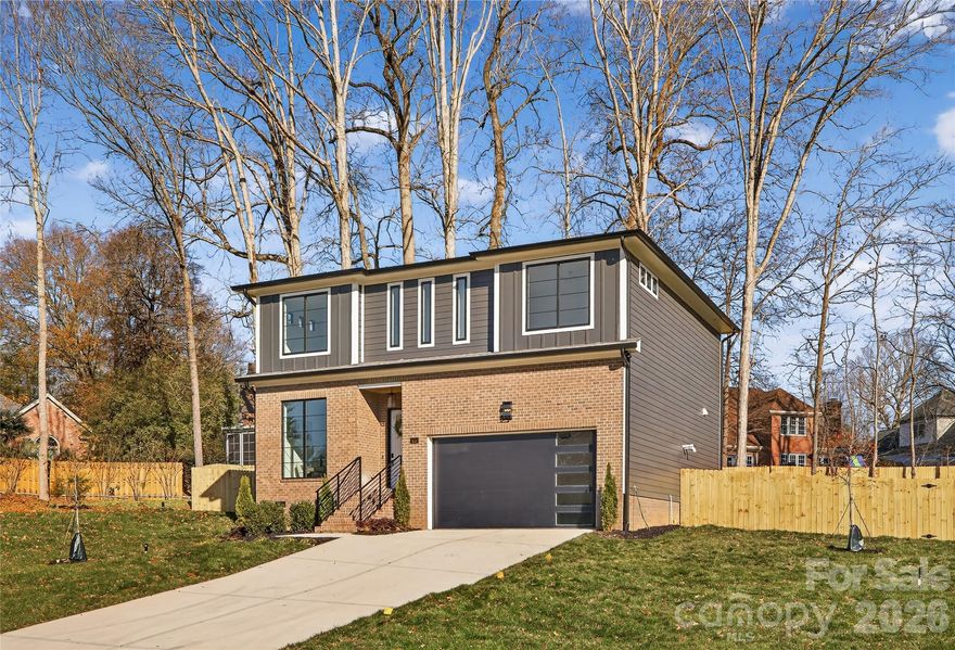 This beautifully crafted home is located in Charlotte's desirable Steele Creek area on Riverpointe Drive. The thoughtfully designed 4-bedroom, 3.5-bath floor plan features soaring 10-foot ceilings on the main level, an open layout ideal for entertaining, and a well-appointed kitchen with a large island, walk-in pantry, and sunny breakfast nook. The inviting family room with fireplace and a flexible main-level space offer both comfort and versatility for everyday living. Upstairs, the spacious owner's suite showcases a spa-inspired bath, while secondary bedrooms provide ample room for family or guests. Conveniently situated near Lake Wylie, RiverGate Shopping Center, and I-485, this home offers modern living in one of Charlotte's most sought-after areas.