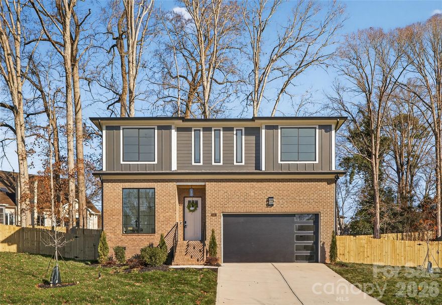 This beautifully crafted home is located in Charlotte's desirable Steele Creek area on Riverpointe Drive. The thoughtfully designed 4-bedroom, 3.5-bath floor plan features soaring 10-foot ceilings on the main level, an open layout ideal for entertaining, and a well-appointed kitchen with a large island, walk-in pantry, and sunny breakfast nook. The inviting family room with fireplace and a flexible main-level space offer both comfort and versatility for everyday living. Upstairs, the spacious owner's suite showcases a spa-inspired bath, while secondary bedrooms provide ample room for family or guests. Conveniently situated near Lake Wylie, RiverGate Shopping Center, and I-485, this home offers modern living in one of Charlotte's most sought-after areas.