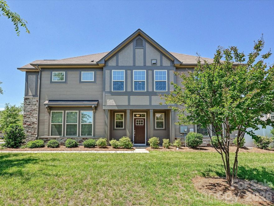 Like new 2-story townhome in Stonehaven at Berewick offering 3 bedrooms, 2.5 baths, and an open, functional floor plan. Main level features a spacious great room with fireplace, chef's kitchen with white cabinets and granite counters and island, breakfast area, and half bath. Upstairs features a loft, primary suite with walk-in closet, and two additional bedrooms each with spacious closest and access to hall full bath. The neutral interior provides abundant light.   Situated on a corner lot with attached 2-car garage, concrete driveway, and in-ground irrigation. Community is managed by Kuester Management with HOA covering lawn maintenance. Convenient to the airport, Uptown, Fort Mill, shopping, dining, and major corridors.