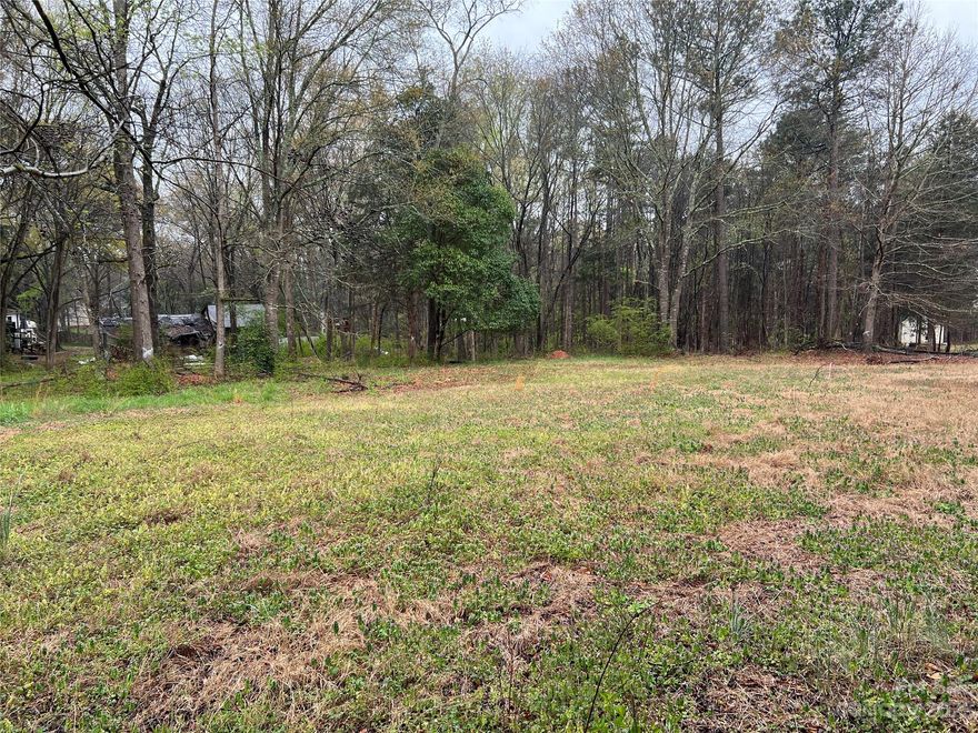 One acre lot in Fort Mill! Come build your dream home on this private, mostly cleared with some wooded areas. Gravel driveway with deeded right of way for ingress and egress. Utilities accessible. Well and septic needed.  The property requires an engineered septic system and has a prior permit to allow construction of a system to accommodate a four bedroom home.  Fabulous location – a short drive to the Fort Mill Parkway, sought-after schools & convenient to shopping, dining & entertainment! Better Hurry!
