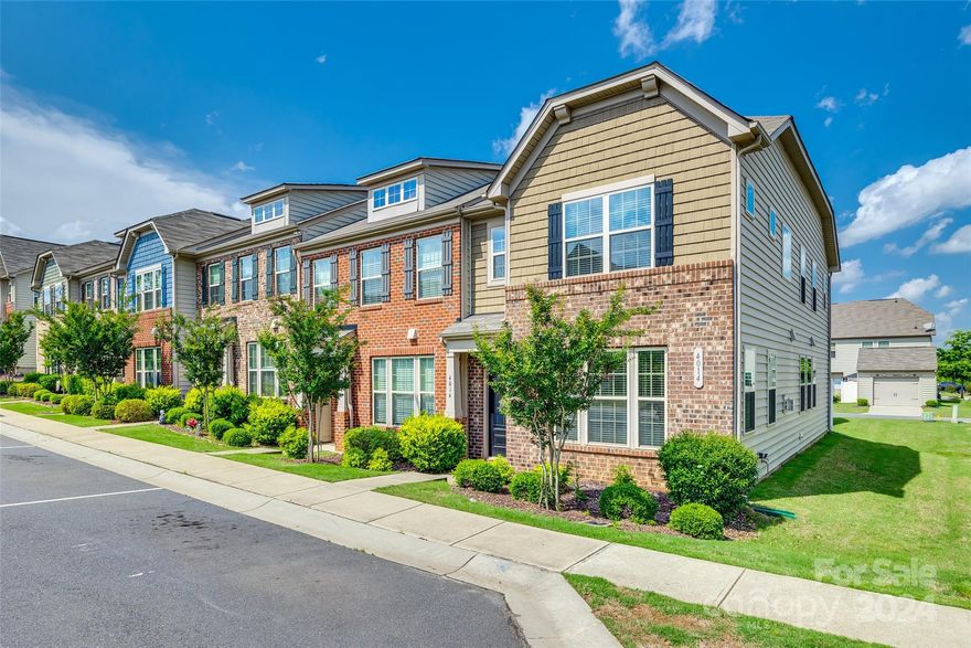 Nearly new end unit townhouse in desirable area. Exceptional layout boasting abundant windows and a main floor office. Wood flooring spans the entirety of the first floor. A stunning kitchen equipped with a gas stove and an island. Enjoy the convenience of a detached garage and a backyard for outdoor relaxation. Upstairs, you'll find a spacious primary suite alongside two additional bedrooms. The second full bathroom features double sinks and connects bedrooms 2 and 3. This prime location offers walkability to shops and restaurants, with Ballantyne just a short drive away.