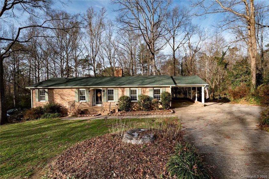 This beautiful 3BR 2BA home is located in the heart of Catawba County in the highly desired Viewmont section! This brick home offers many updates to include new roof, heat pump, new flooring, and more! You'll love the large lot with an oversized back yard which is bordered by a small stream and surrounded by woods which offers shade and privacy. The spacious carport is a good place to park and enter the side door which brings you right into your kitchen and is convenient for bringing in groceries and such. The kitchen has updated appliances that remain, lots of cabinet space and new flooring! The interior offers a breakfast nook, a formal dining area, den, living room, three good sized bedrooms, two bathrooms! This home also has a finished basement with features including a bar, FP, "home school area", sliding doors leading out to the back yard, and lots of place for storage! If you are looking for a convenient location in an established neighborhood be sure to check this one out.