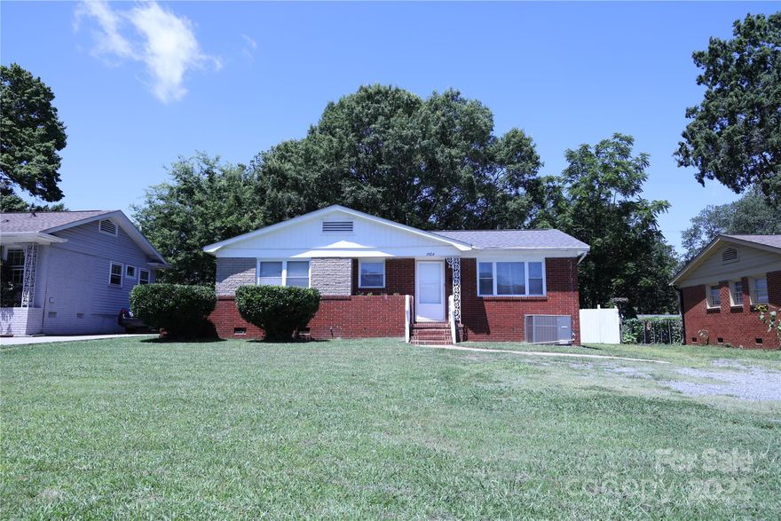 Welcome to this charming 3 bedrooms, 1.1 Bathrooms Brick Bungalow. Freshly painted throughout. Spacious Kitchen with brand new beautiful Quartz Countertop, stylish tile subway backsplash and a new deep sink. Freshly painted Kitchen Cabinets. New Dishwasher and Microwave, Newer other Appliances. Charming beautifully refinished original hardwood Floors. Big convenient Carport with spacious storage space. Fully fenced large private back yard—ready for you to enjoy after workday. New Roof! Located minutes from Plaza Midwood, NoDa, & Uptown. Do not miss on this great opportunity!!