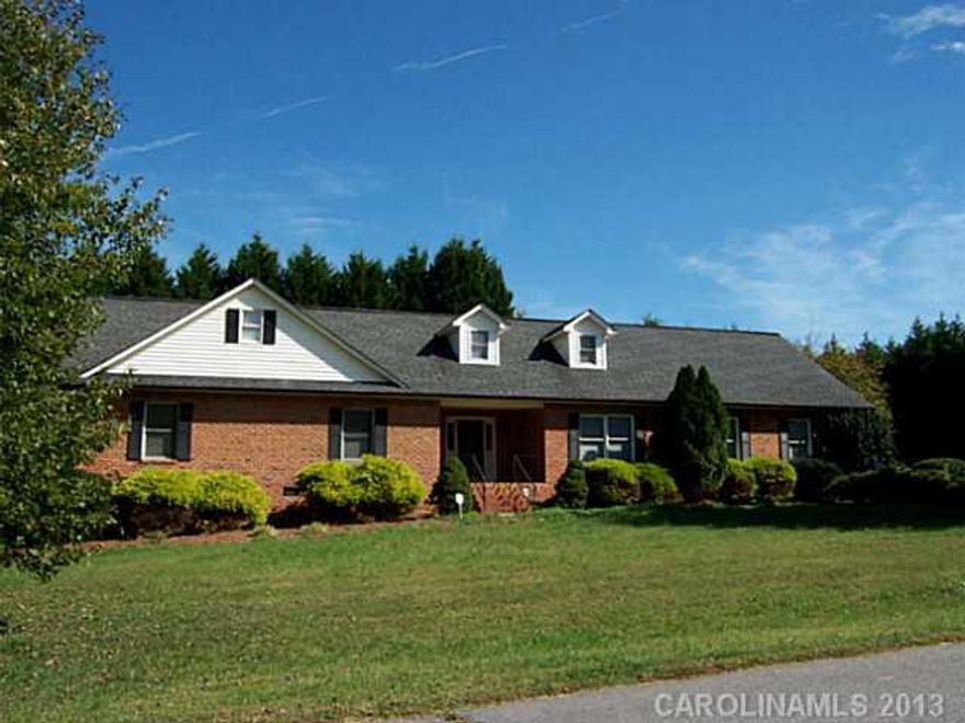 Spacious 4 bedroom, 3 bath with living and dining room on first floor and 4th bedroom and bath on second floor, large second living area on second floor.  Fenced back yard, security system, 9 x 34 ft. deck   Pull down stairs in garage  for storage area.