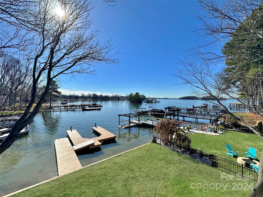 Waterfront Below $1.5M! Renovated head-to-toe, this newly refreshed architectural gem is the perfect blend of contemporary style & serene lakeside living. The pristine modern lake house provides an ideal haven for those seeking a harmonious blend of modern living & natural beauty. Upon entering one is immediately greeted by an abundance of natural light flooding through floor-to-ceiling glass doors, highlighting lake views. The neutral color palette, combined with the warmth of natural wood accents, creates an inviting and cozy atmosphere. The stylish kitchen boasts state-of-the-art appliances and sleek countertops, making it a dream for any culinary enthusiast. Enjoy a morning cup of coffee or stunning evening SUNSET views on one of the spacious outdoor terraces. Entertain guests in the fabulous LAKESIDE ROOM (sq ft not included in heated living area) with pop up glass window overlooking shimmering waters. Private dock, no HOA!