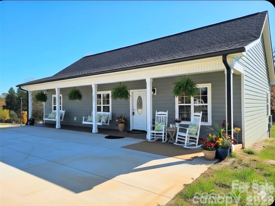 NEW CONSTRUCTION~A thoughtfully crafted, energy-smart home combining quality materials and lasting performance! This exceptional 3BR/2BA single-level home on a spacious, level lot just minutes from schools and downtown Morganton is perfect for gardening and outdoor entertaining. 

Note the level entry from flat driveway and 36 inch doors to primary bedroom, primary bath, and second bedroom for accessibilty.

Enjoy country views, sunlight-filled rooms, and gorgeous 4-inch white oak flooring throughout. The kitchen and baths feature Carolina Custom Cabinets with granite countertops and stainless-steel appliances, while bathrooms include ceramic tile floors and one-piece acrylic tubs/showers. The primary suite offers a walk-in closet, 36-inch doors, and private bath that includes a walk-in shower with seat. Guest bath provides a tub/shower combo. 

Lighted closets and a functional laundry area add convenience. Built for comfort and efficiency, this home features a Fox Block foundation, sealed crawl space with dehumidifier, 2x6 exterior walls (R-19 insulation), R-44 attic insulation, and a high-efficiency Trane heat pump. Low-maintenance exteriors include Everlast siding, Trex decks with aluminum railings, PVC-covered posts, and treated lumber.