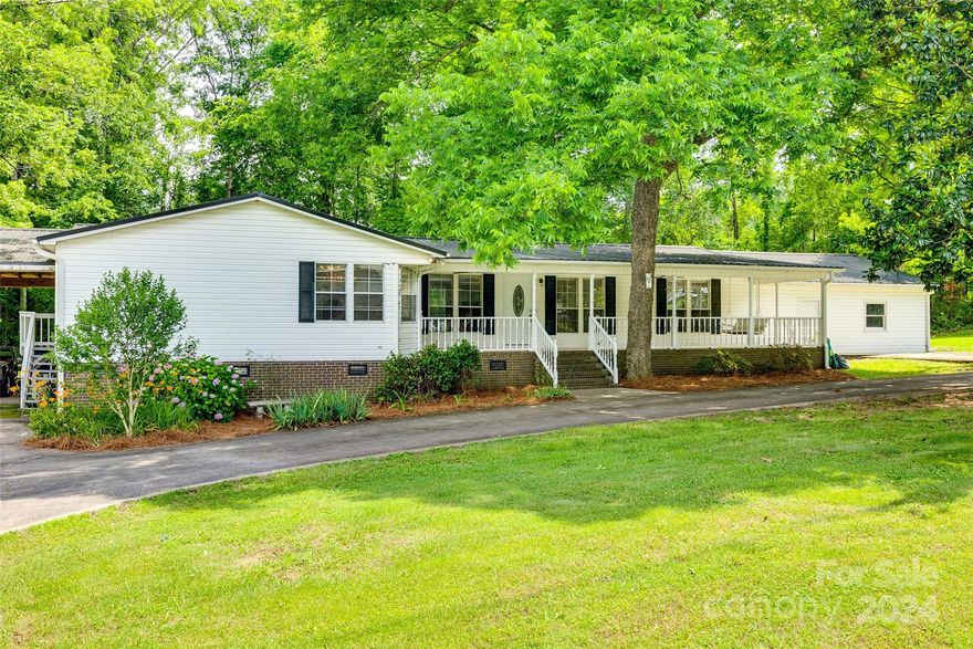 Nestled on over 1.5 acres, this charming 3-bedroom, 2-bath ranch home offers a unique opportunity for airplane enthusiasts with no HOA and no restrictions. Conveniently located near York Aviation off Highway 321 and close to the Highway 5 Bypass, this property boasts spacious rooms perfect for gatherings. Enjoy peaceful mornings on the rocking chair front porch, and make use of the nice, detached building and ample parking space. The well-maintained home features fresh paint and is ideal for those looking to bring their chickens and embrace a rural lifestyle. Don't miss out on this rare gem! As of October 15, 2024 the kitchen features freshly painted walls, cabinets, and added new backsplash. Guest bathroom freshly painted walls and cabinets.