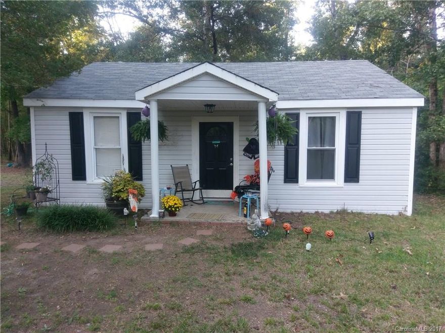 Approximately 3.2 acres of prime location near historic downtown Fort Mill is now available. The land comes with a nice, small home that the buyer can live in if they like. Please note that the seller is selling the land; the house is an added bonus!  

Although the house is in excellent condition, it is being sold "As-Is." 

Drive by to see the land, or make an appointment to see both the land and the home. This lot is priced at less than HALF the cost of the lot next to it, please hurry!