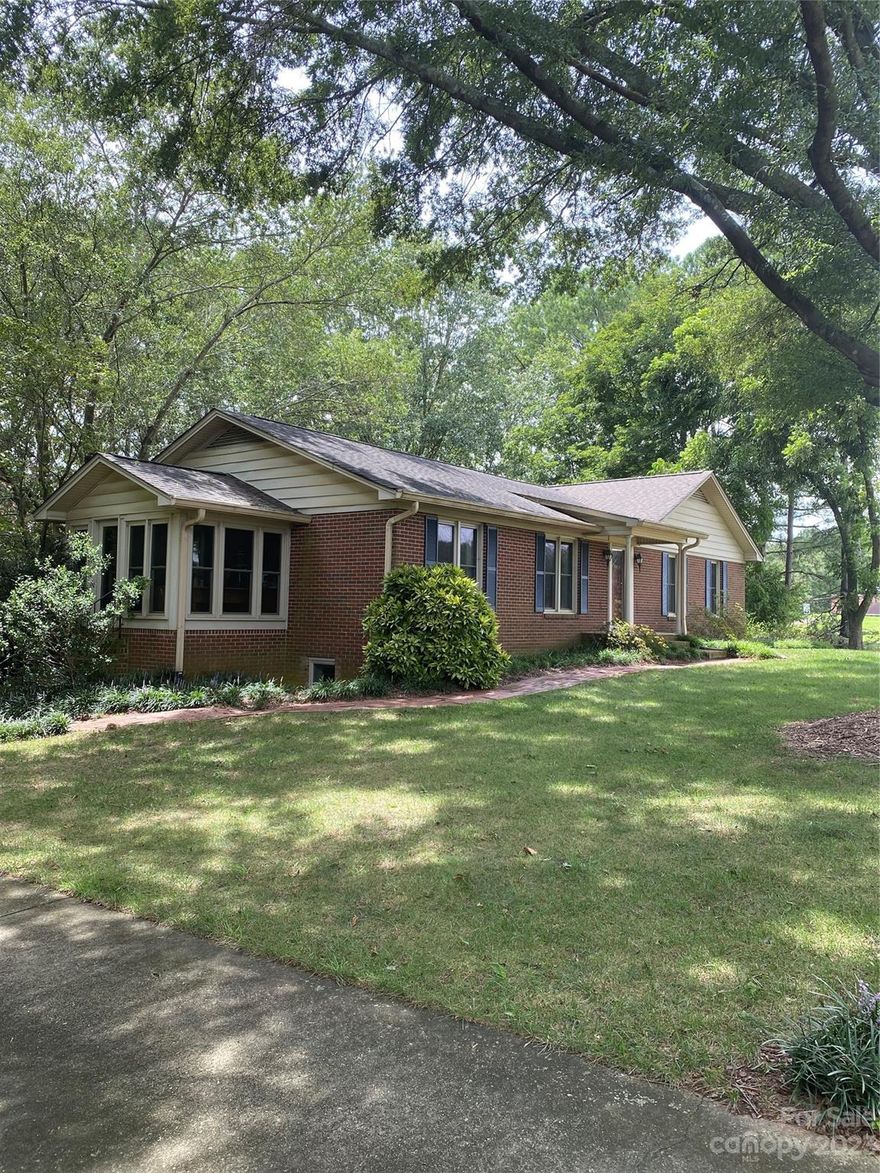 Appraised for $505,000! Farm Living on 7.7 acres! Perfect for Horses! Approximately 5 acres of fenced in pasture. The barn includes 2 stalls, wash room, tack room and hay loft. Barn and utility building where both painted in 2022.
This nice 3 bedroom, 3 bath, 2 car garage, ranch home has a fully finished basement which was completely remodeled in 2021. Renovations to basement include new LVP flooring and wet bar with granite counter top. The stairwell treads, wet bar shelves and mantle are beautifully done with live edge walnut! The spacious main level primary bedroom and bath are a must see with a large walk in closet, double vanity sinks and frameless glass shower. The kitchen features custom cabinets and quartz counter tops with stainless steel Kitchen-Aid brand appliances installed new in 2020. Home has gas logs on the main level and basement. This move in ready farm living home is just what you need and only minutes from Uptown Shelby and Downtown Boiling Springs!