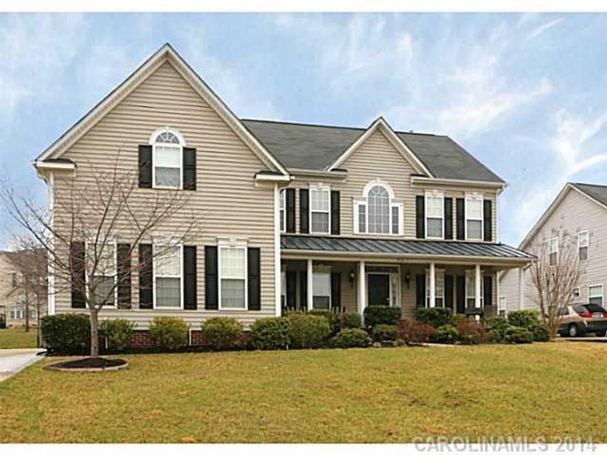 Gorgeous Brazilian cherry hardwood floors,2-story great room,and cook's "dream kitchen" distinguish this Fort Mill home.You'll love the location for easy access to I-77 for a convenient commute to uptown.Easy flowing floorplan with main floor office(or guest room),formal living & dining. Curl up with a book in the sunroom, overlooking fenced garden with deck & stone patio.3 Car Garage.See tour!