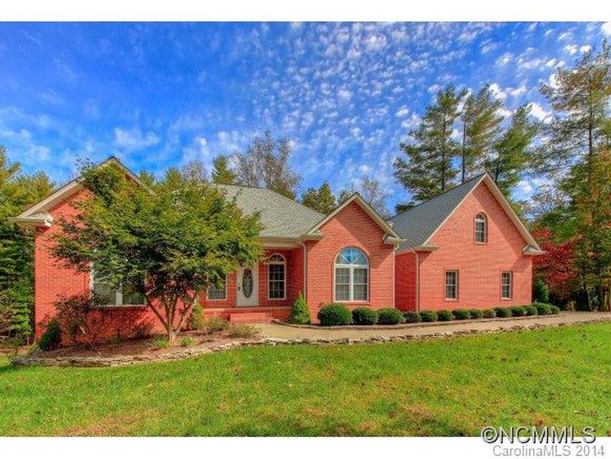 Low maintenance brick home in super convenient location.  Nice front and back yard with covered and open decks.  Just minutes to town, but out of the city.  Large rooms, formal dining, breakfast area, spacious master suite with incredible spa shower!