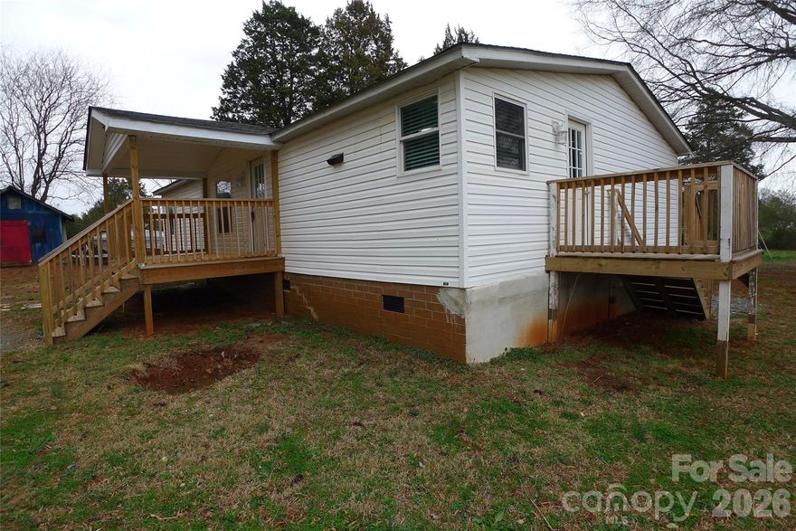 Welcome to this beautifully updated 3-bedroom, 2-bathroom manufactured home located at the quiet end of the street. This move-in ready home features recent paint, renovated bathrooms, brand-new appliances, durable LVP flooring, and a cozy fireplace that creates a warm and inviting living space. Enjoy outdoor living with recently built decks overlooking a nearly level yard, perfect for relaxing or entertaining. With thoughtful updates throughout and a peaceful setting, this home offers comfort, style, and convenience.