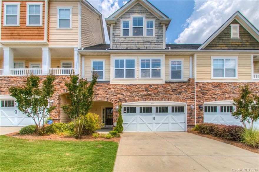 Simply gorgeous townhouse with lake views. Fantastic upgrades include granite countertops, hardwood floors, granite fireplace surround, new carpet. Plenty of windows, spacious master, palatial master bath, private balcony decks off master AND third floor bonus/bedroom. Tons of storage - walk in attics. Easy Living! Exterior maintenance managed by HOA. Enjoy all that living the good life has to offer. Located in the sought after Tega Cay Peninsula. Walk to lake, pool, trails, parks. Perfection.