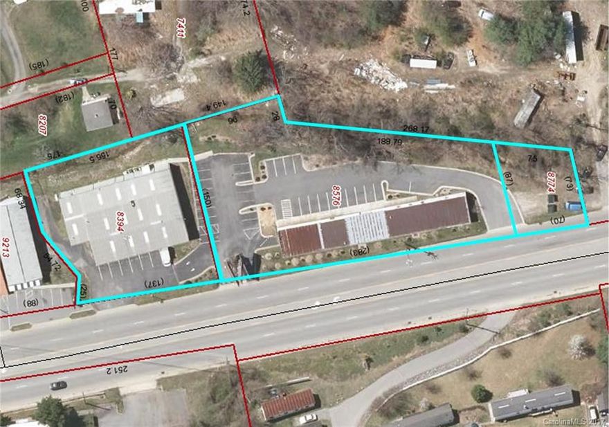 2 Buildings on 1.71 Acres. A Beautifully Maintained 7,110 SF Office Building/Retail Showroom with Loading Dock and a 4,680 SF Masonry Warehouse for Storage, all w/ Ample Parking. Excellent Investment Opportunity OR Lease the Office @ $12/SF NNN or Lease the Warehouse for Storage @ $5/SF NNN. Property has Income Producing Billboard Lease as well. Great visibility with 22,000 VPD on Sweeten Creek Road, just 1.4 miles from I-40. Portions of Property in Flood Plain, but Office Building is not.