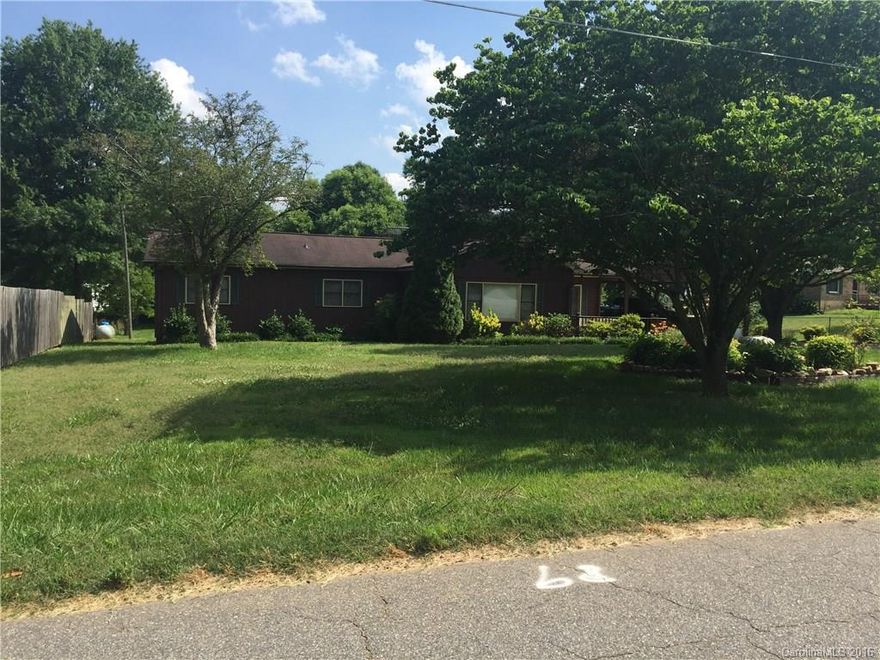 Make this Lake Access Home your weekend retreat or your primary residence! 2282 heated sf includes 3 Bedrooms and 2 baths, spacious kitchen with bar and lots of cabinets, breakfast area and dining room. laundry room has utility sink, living room, den with fireplace and gas logs, sunroom. detached carports and outbuilding, new heat pump, $209,900