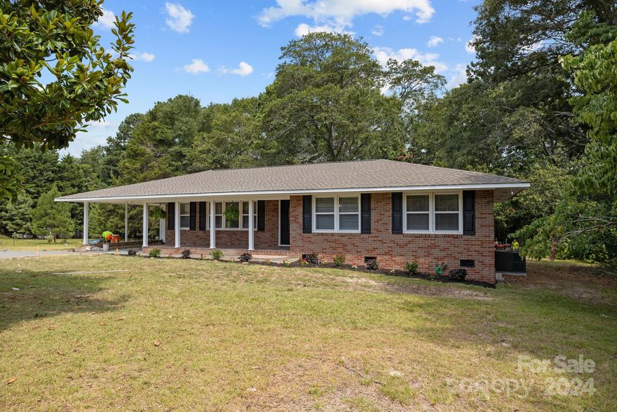 This beautiful 3-bedroom ranch home sits on a large lot (approx. 1.19 acres) It has all-new plumbing, a new kitchen with granite count, a large island in the kitchen, and 2 new bathrooms. Wood floors throughout. New paint throughout. Large front porch. All new energy efficient windows. Seller is highly motivated.