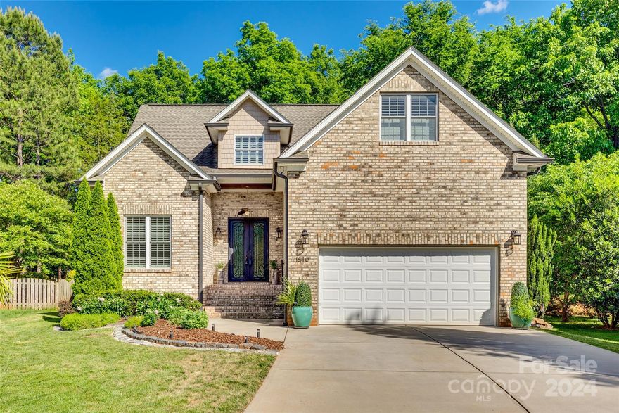 Welcome to this stunning, well-maintained 4+bedrooms and 3 full baths nestled at the end of a serene cul-de-sac. As you step inside, the open floor plan unfolds, revealing an ambiance of effortless elegance. A striking brick accent wall adds character to the expansive living area, while a well-appointed kitchen beckons with its inviting island and walk-in pantry, offering a perfect setting for culinary creativity. There is a generously sized primary bedroom on the main level, complete with an en suite bathroom and walk-in closets. There is also an office on the main level that can be used as a guest bedroom. Ascend the stairs to discover a media room, ideal for relaxation and entertainment, alongside a potential fifth bedroom, currently serving as a workout space. Outside, a covered patio provides a charming retreat, overlooking the fenced backyard lined with trees to ensure privacy. This home is perfect for enjoying life in comfort and style.