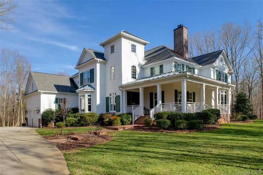 Rare fenced 5 acre private Arcadia built home 20 min from Ballantyne.  Marvin schools!  Gated drive & private tennis/b-ball court. 2-sty entry hall & great room w/ hardwood floors, custom moldings & casings,
stonework, exposed beams, & extensive woodwork. Gourmet kitchen w/ built-in panel fridge, granite
counters, custom cabinets & lighting, apron sink, & island w/ bar seating. Master ste on main floor. Office,
study, rec room, & loft! Wrap around front porch & screen porch w/ stunning views!