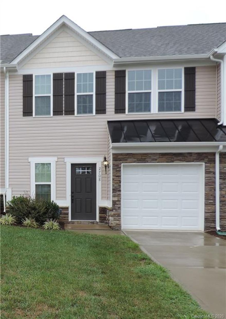 Fabulous 3/2.5 TH with 1 car garage in gated community! Beautiful Dark Rich Hardwood floors on first floor. Kitchen with gas cook top, Granite counters and 42” cabinets. Spacious great room & dining area.  Good size bedrooms. Walk in closets. Washer and dryer included. Community pool, clubhouse with pool table,  kitchen and fitness. Near TONS of shopping, restaurants & great access to I-77/I-485, and uptown. Water and trash is included in rent payment. Must see! Hurry! Won't last long!