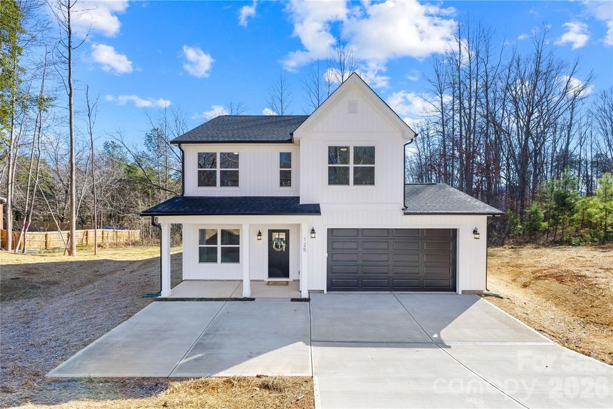 Welcome to this beautiful new construction home offering 3-bedrooms, 2.5-baths with a clean modern design throughout. Step inside to find durable LVP flooring that flows seamlessly through the open-concept living areas. The kitchen shines with quartz countertops, matte black fixtures, and stylish cabinetry—perfect for cooking and entertaining. Upstairs, the spacious primary suite offers a tiled shower and elegant finishes. Two additional bedrooms and a two full baths provide plenty of space for family or guests, and the laundry room is conveniently located on the upper level with the bedrooms. Ideally located near Crowders Mountain State Park, Davidson Lake, Two Kings Casino and the Carolina Thread Trail, this home is perfect for those who love the outdoors. Enjoy hiking, kayaking, and exploring nature just minutes from your front door. Conveniently close to Interstate 85, commuting and weekend getaways are a breeze. Experience the best of modern living in a location that perfectly blends comfort, style, and adventure!