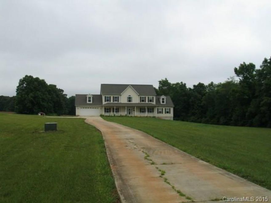 2 Story R-Anell Modular on poured concrete wall basement foundation. Basement has access from inside and outside the home. Lots of storage and potential in basement. Walk in attic. Spacious home with lots to offer- private setting. Home has 5 bedrooms with a 4 bedroom septic tank. Home needs TLC but priced accordingly. Bank owned proeprty to convey in as is condition and by special warranty deed. Buyer / Buyer Agent to verify all info and systems