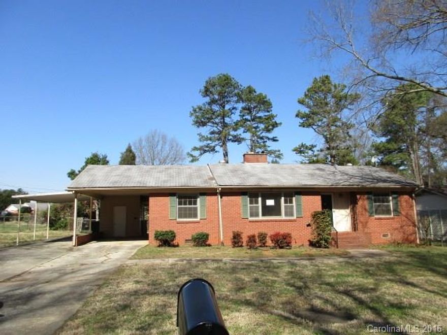 Full brick, single story home features 2 bedrooms, 1.5 baths, den, kitchen, living room, and dining room. Features include some wood floors, fireplace, and ample kitchen cabinet spaces. Home sits on 0.27 acre fenced lot with 2 car attached carport. There is a slab ready for a shed in the yard.