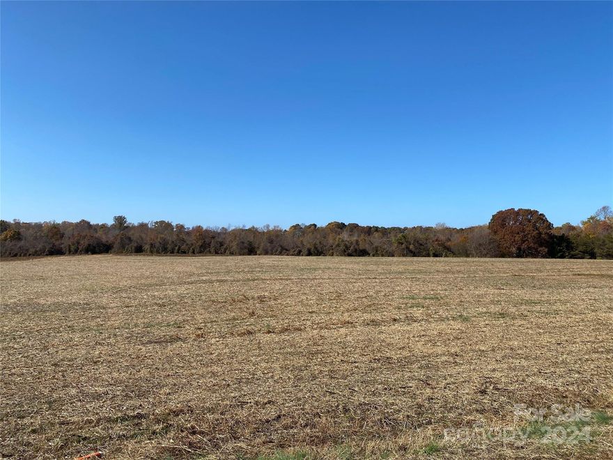 This 2.34 acre lot provides an open, flat area along the road to build. Would set up perfectly for a mini farm or equestrian estate. Additional land available adjacent to this lot if you prefer a bigger lot. Build with our preferred builder or bring your own. Minimal restrictions in place and no timeframe to build!