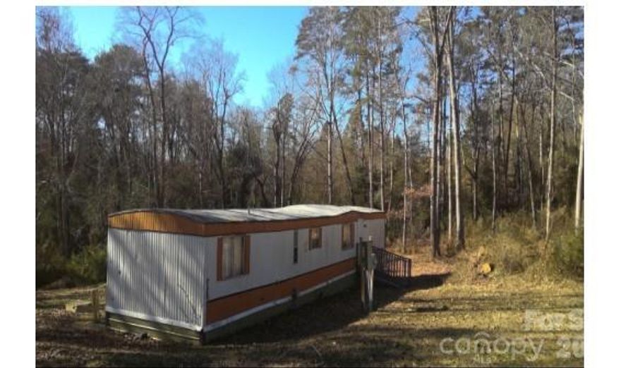 Calling all Investors! This 2Bed/1.5Bath manufactured home located on Lot #5 is currently leased. 1985 Wing MHP with central air and electric heat pump. Selling Units #2-6.