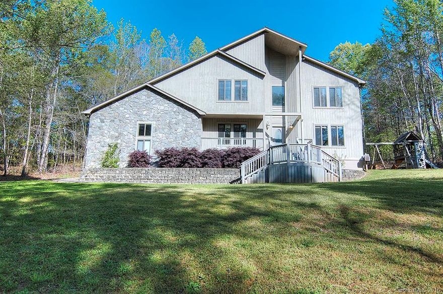 Spacious contemporary on wooded 2 acres. Minutes from Ballantyne. Open floor plan. 2 story great room with wet bar. Kitchen with granite counters, stone backsplash, custom cabinetry & wine fridge. Huge dining room. Guest bedroom and full bath on main level. Large master suite with balcony. Whirlpool tub in master bath. 2 additional bedrooms with shared hall bath on upper level. Screened porch & deck on rear of house. Enclosed workshop in garage. Addl crawl space storage. Equestrian facilities.