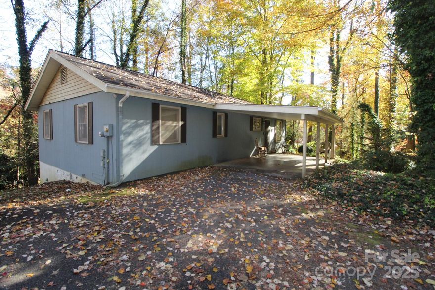 Tucked among the trees north of Lenoir and just 25 minutes from Blowing Rock, this charming 1,269 sq. ft. home is the perfect place to unwind, recharge, and enjoy the beauty of the Blue Ridge Mountains.
With 3 bedrooms and 1 ½ baths, there’s room for family, friends, or guests. The heart of the home is the light-filled living room, where big windows frame wooded views and a wood-burning stove with built-in floor-to-ceiling bookshelves creates a warm, inviting space to gather. Step outside onto the deck surrounded by nature, an ideal spot for morning coffee or an evening under the stars.
The dining room offers space for cozy meals and conversation, while the efficient kitchen makes it easy to whip up a mountain breakfast before heading out for the day. The full basement and carport add storage and convenience.
Whether you’re dreaming of a peaceful personal retreat, a weekend getaway, or a short-term rental opportunity (Airbnb allowed), this home has the flexibility to fit your lifestyle. It’s comfortable and move-in ready, with plenty of potential for updates that would truly make it your own.
Affordable, private, and brimming with mountain charm — this is the getaway you’ve been looking for.